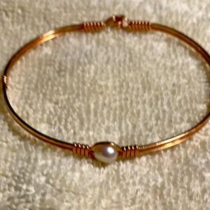 Ronaldo rose gold with pearl bracelet.